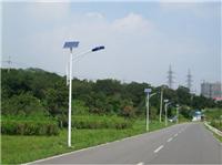 Solar street lights point to the village like a newly installed