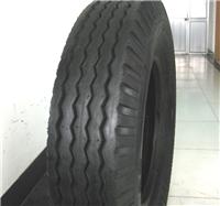 供应橡胶轮胎水曲花纹9.00-20拖拉机轮胎