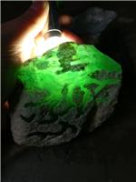瑞丽市鑫劦飞翡翠原石OX181莫西沙场口，玻璃种睹石，带阳绿
