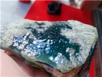 瑞丽市鑫劦飞翡翠珠宝年代OX187莫西沙场口玻璃种翡翠原石