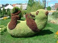 仿真熊猫绿雕 绿色熊猫雕塑 假动物造型