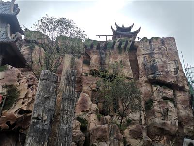 江西南昌塑石假山、旅游景区塑石大门、景区压模地坪