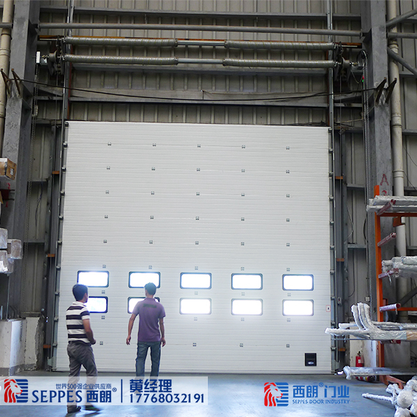 苏州电子厂抗风防盗带视窗小门工业提升门厂家