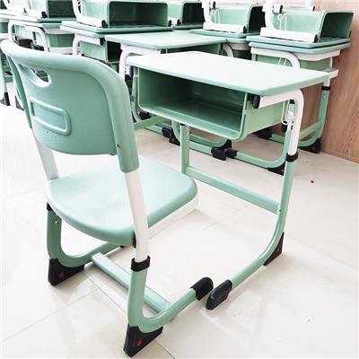河南华闻校具厂生产各种款式课桌椅郑州课桌厂家