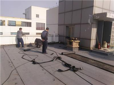 天津塘沽区楼顶防水维修补漏-----铺油毡保修十年