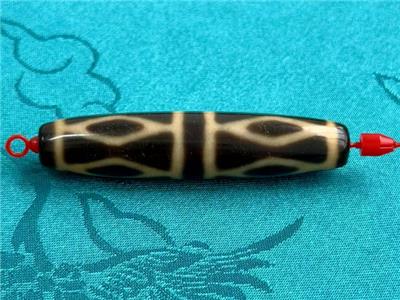 山东定制地觉醒八眼天珠规格 诚信互利 肥城地觉醒天珠珠宝供应